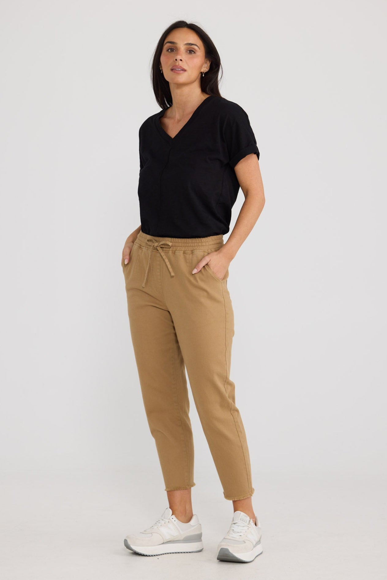Model wearing Wayfarer Pant in Taupe by Brave + True, view 5.