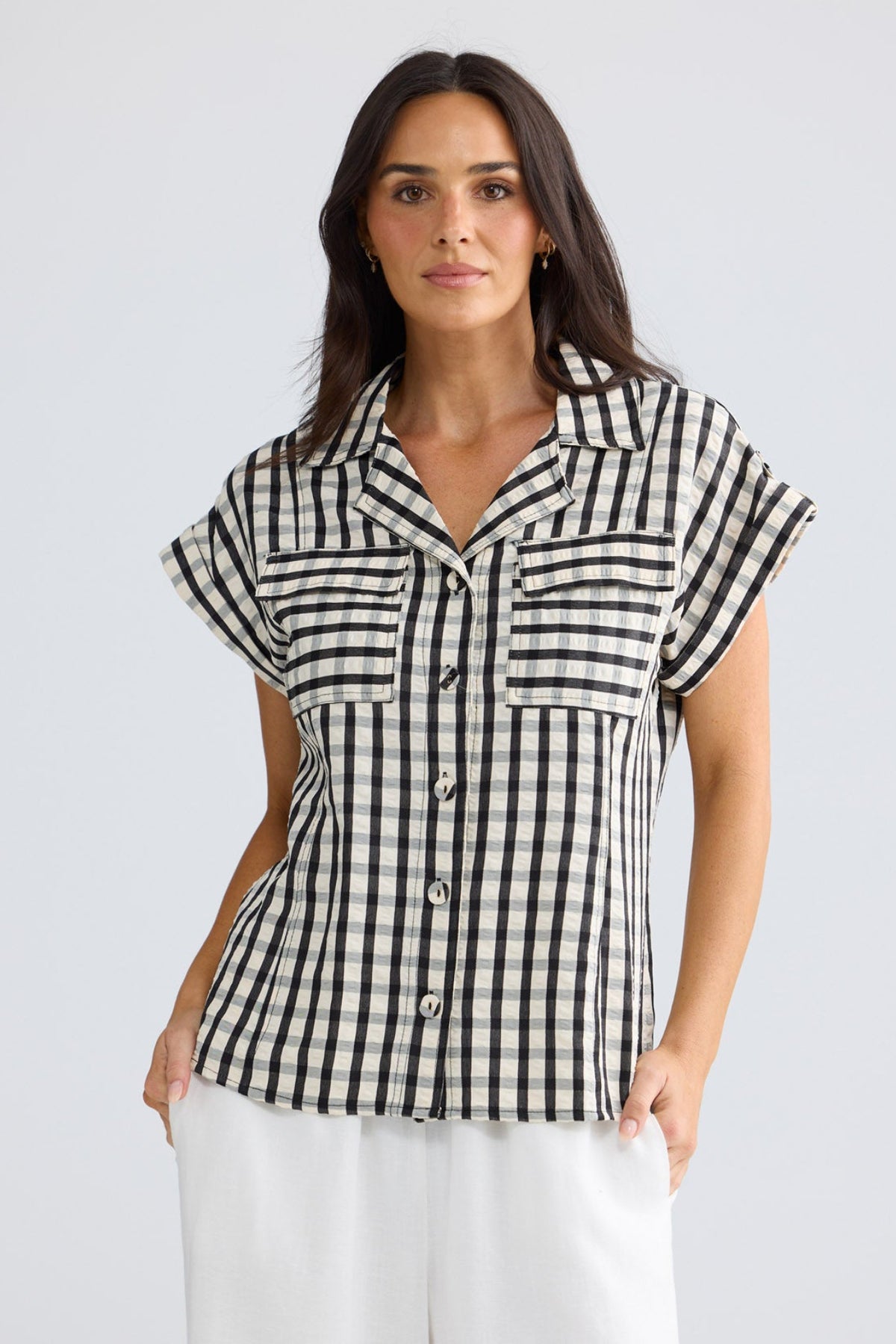 Model wearing Portia Shirt in Black Gingham by Brave + True, view 2.