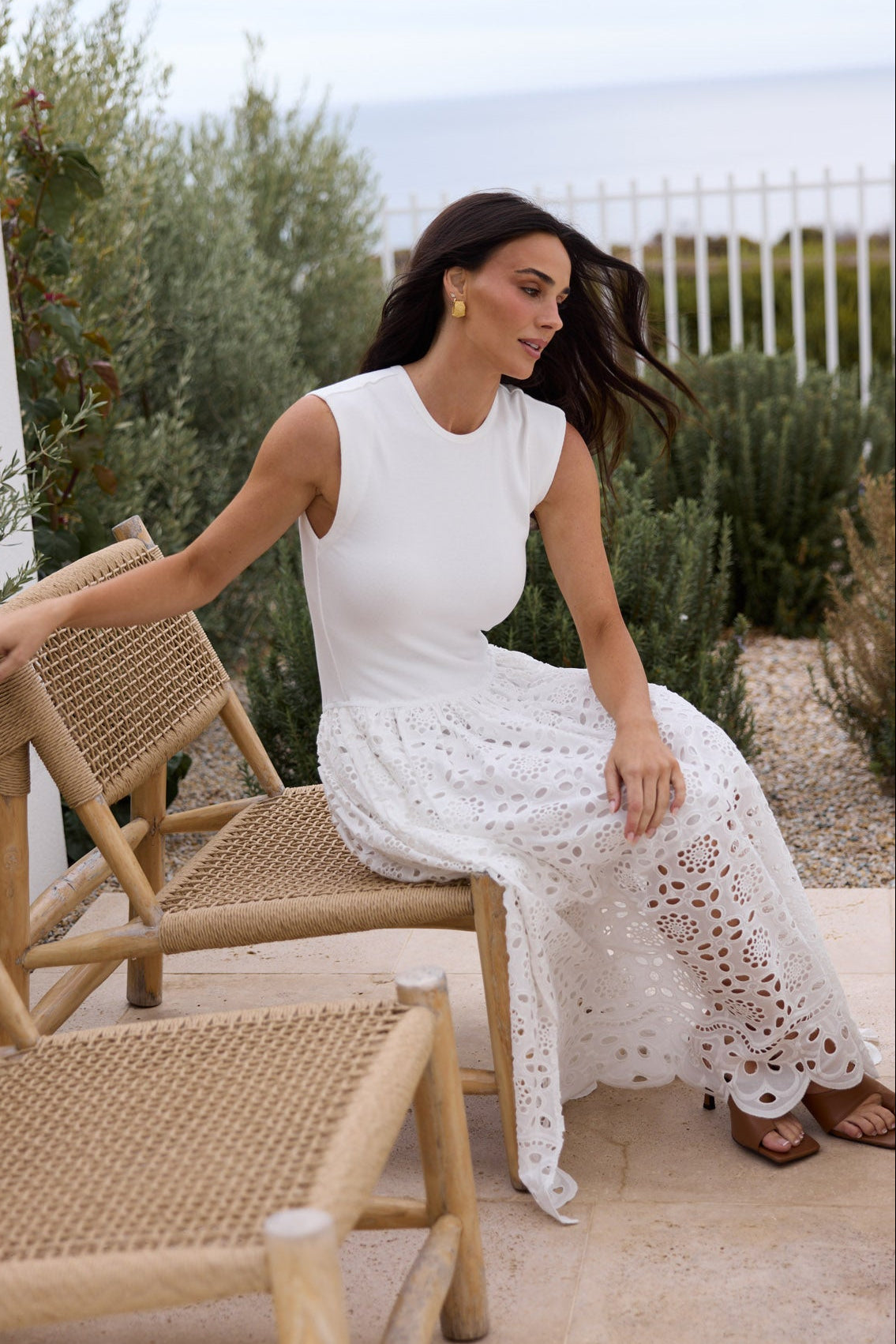 Model styling Daphne Dress in White by Brave + True, campaign lifestyle look.