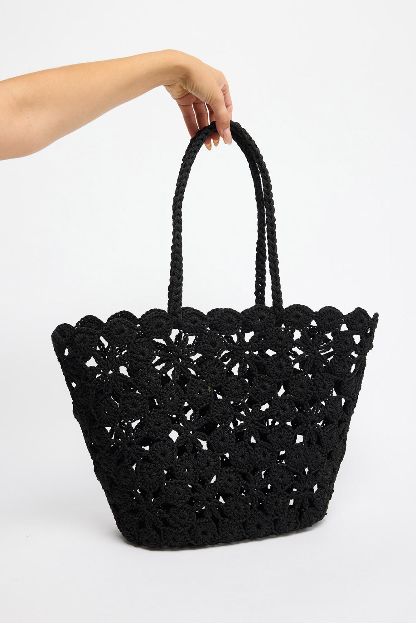 Lucy Basket in black, front view.