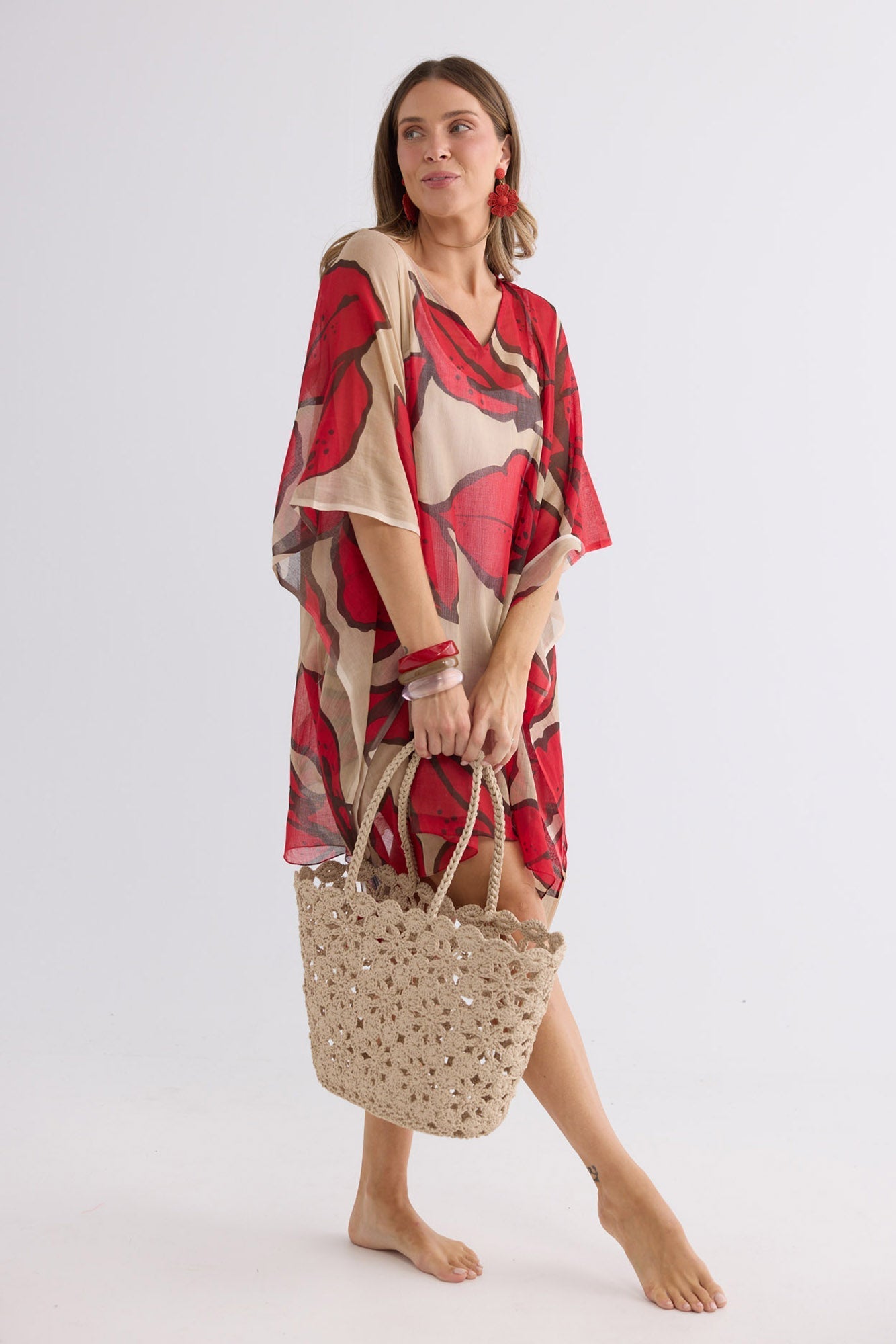 Lucy Basket in beige, side view.