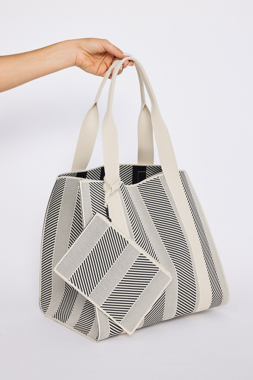 Bellagio Tote Bag - Black tote bag in black with geometric weave, front view.