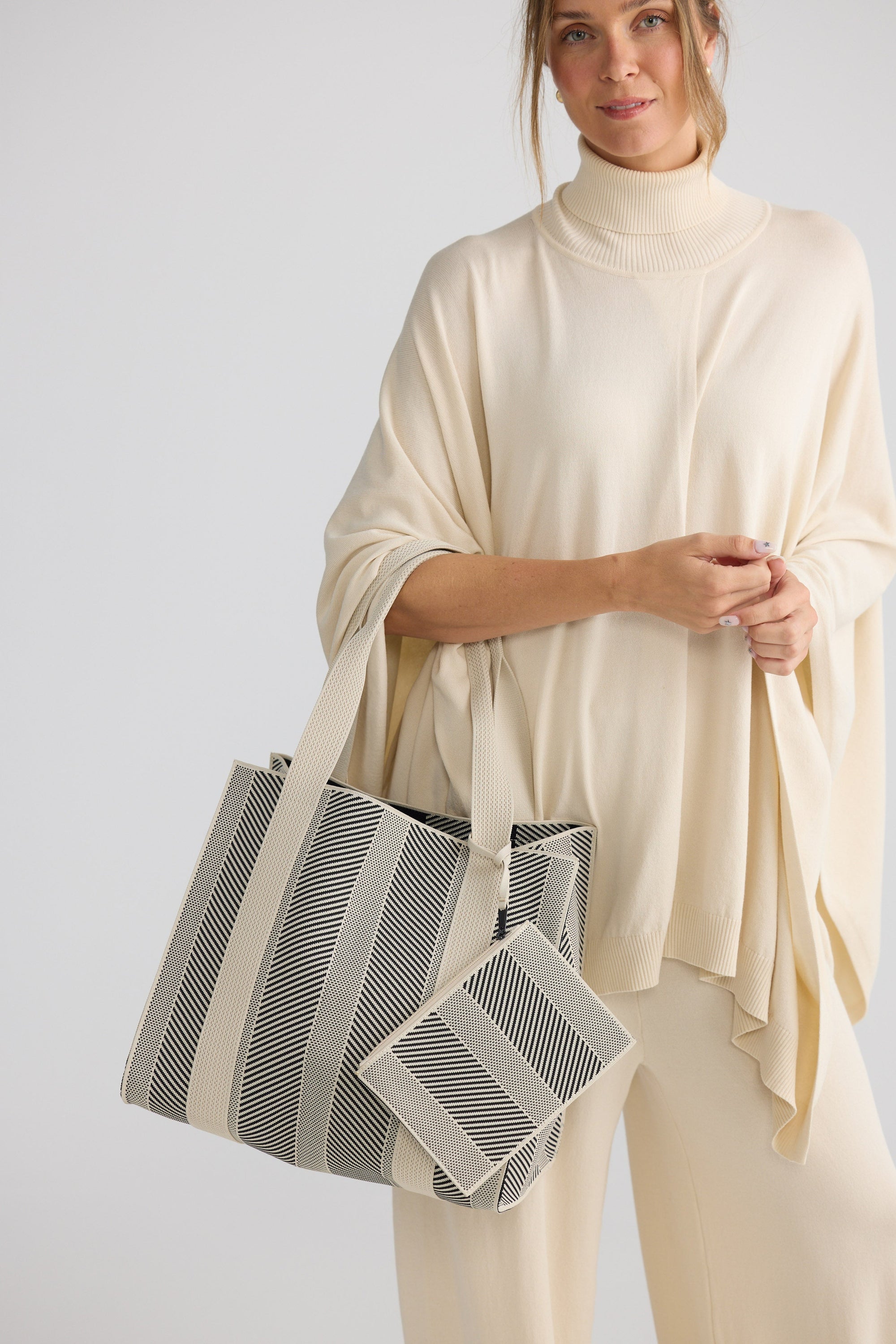 Bellagio Tote Bag - Black tote bag in black with geometric weave, detail view.