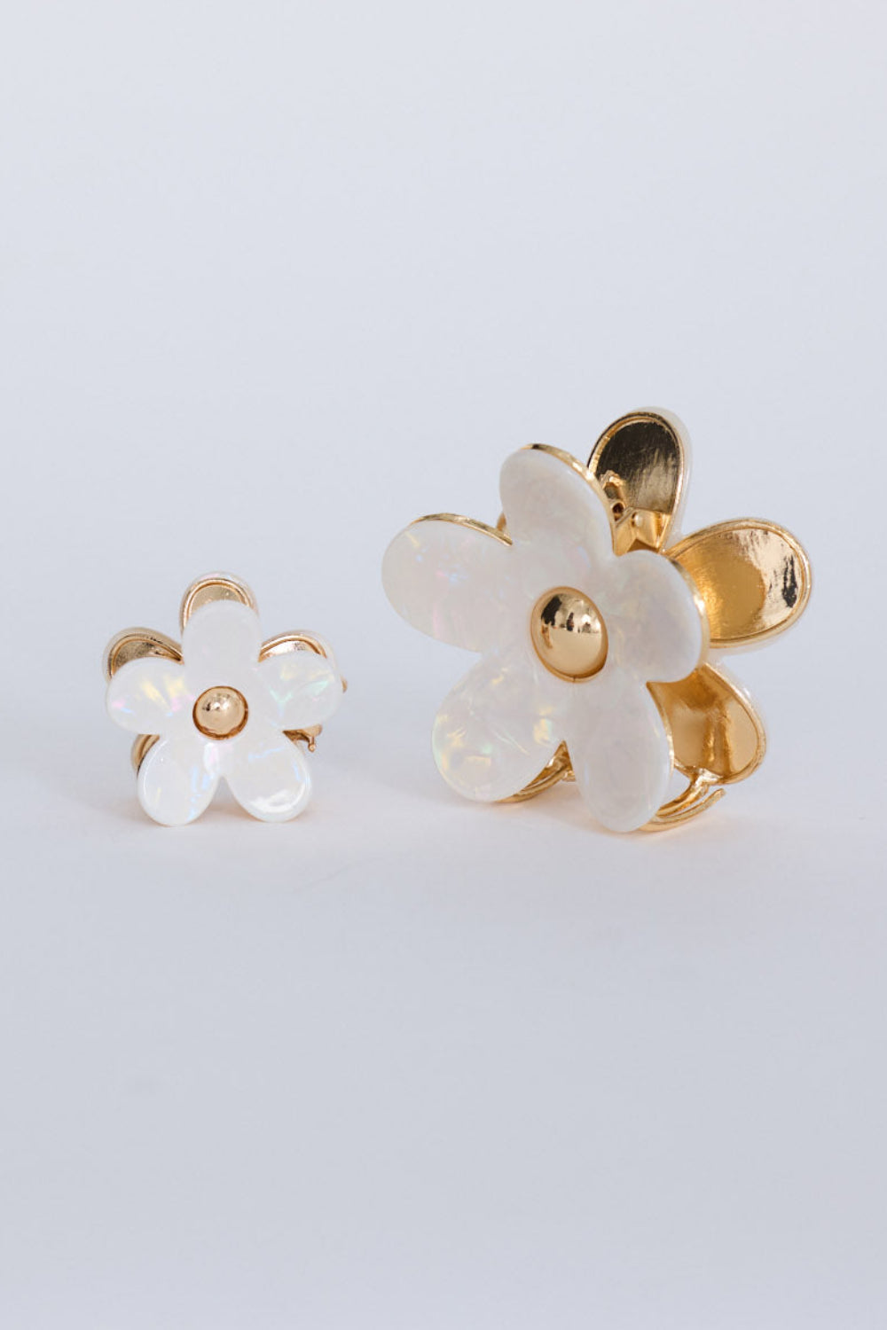 Flora Set Of 2 Hair Claw - Cream hair claw in cream with floral silhouette, front view.