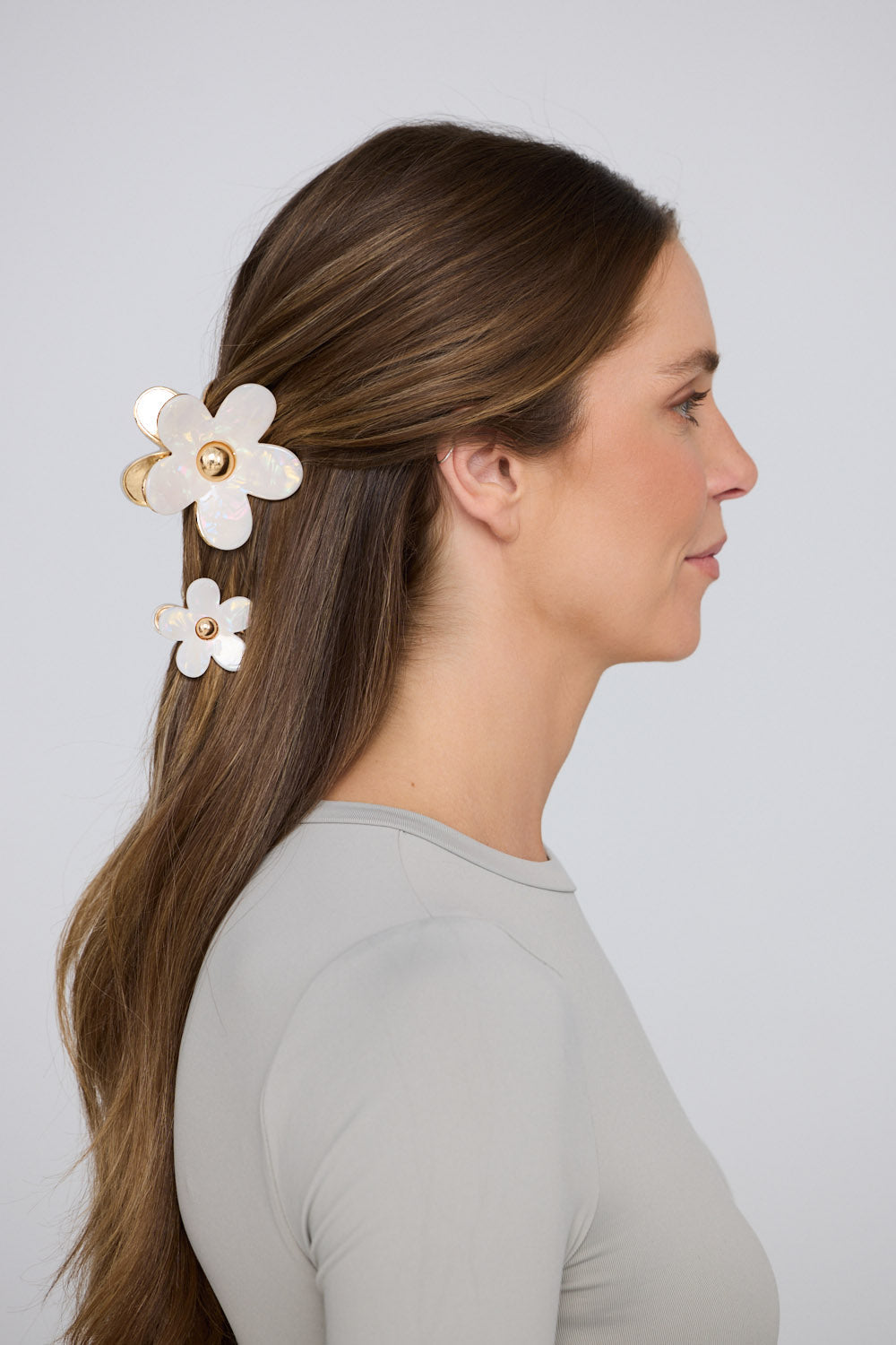 Flora Set Of 2 Hair Claw - Cream hair claw in cream with floral silhouette, alternate view.