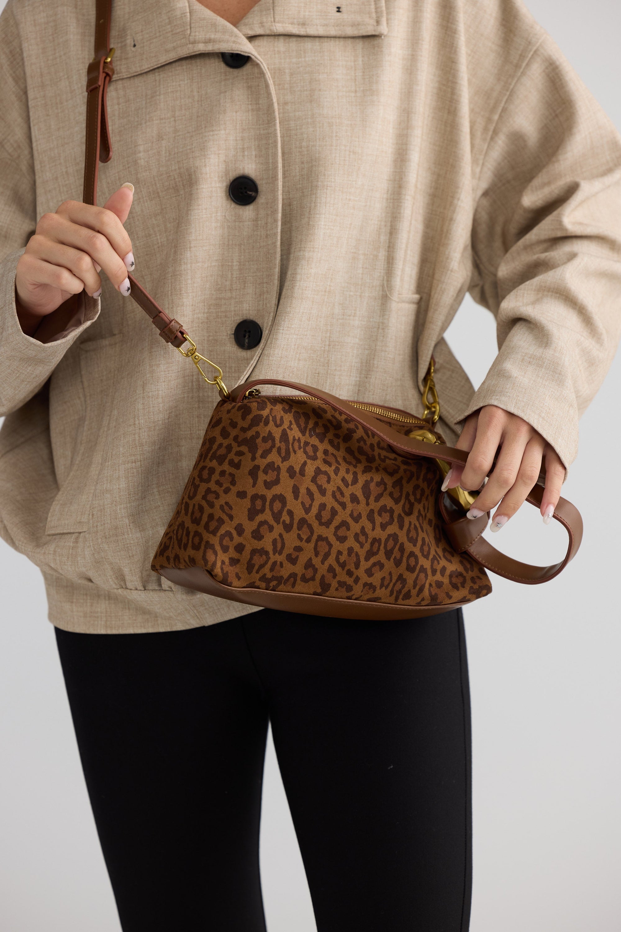 Lola Handbag - Leopard handbag in leopard with leopard print, styled view on white background