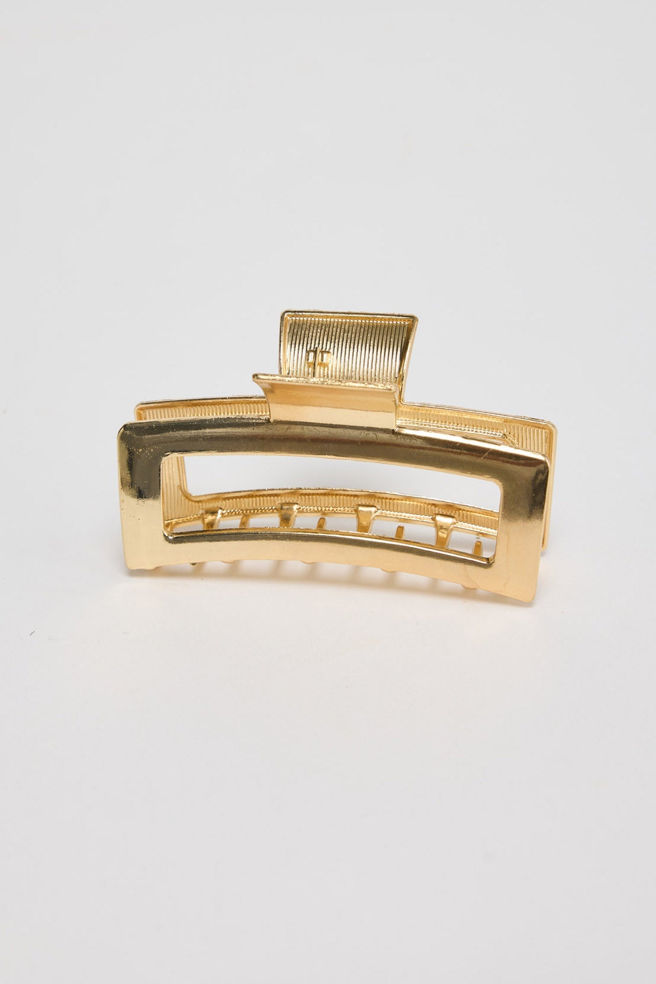 Shelby Hair Claw in gold - front view of the rectangular metal hair claw