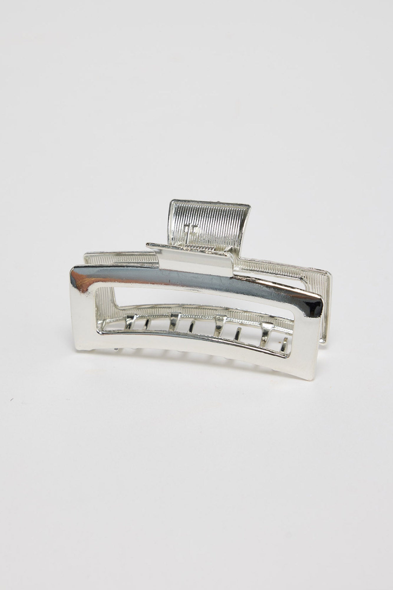 Shelby Hair Claw in silver - front view of the rectangular metal hair claw