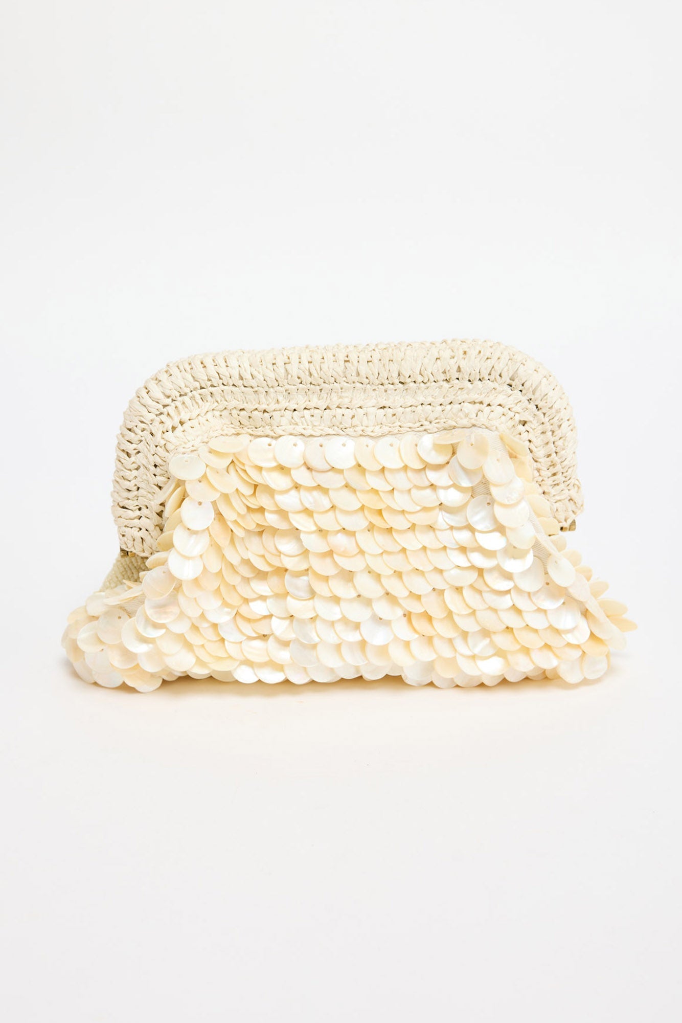 Sandy Clutch in creme open, showing the fabric-lined interior with an inner slip pocket
