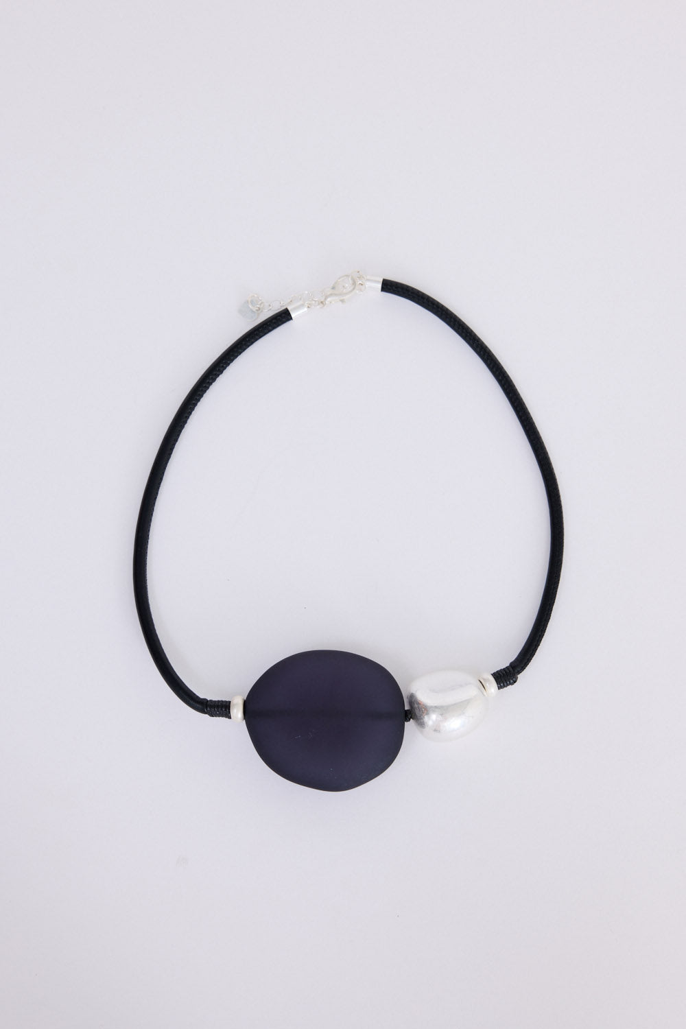 Stefani Choker in black with statement feature pendant, front view.