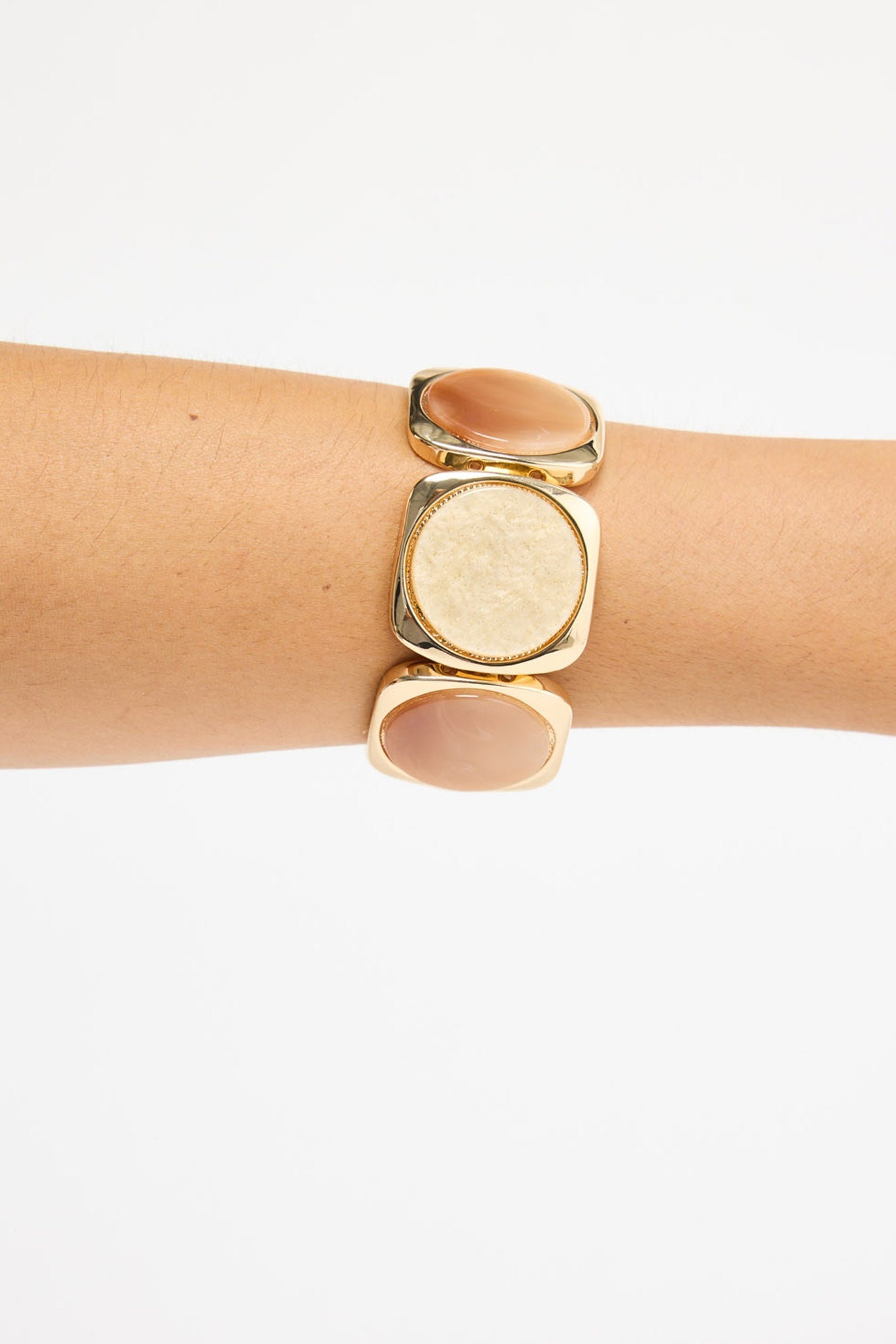 Rover Stretch Bracelet in salmon with white worn on the wrist, showing fit and colour alternation