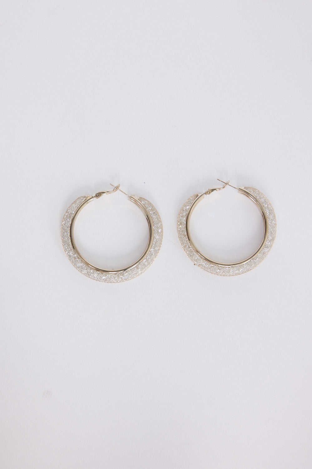 Graceful Earrings in gunmetal with soft textured finish, front view.