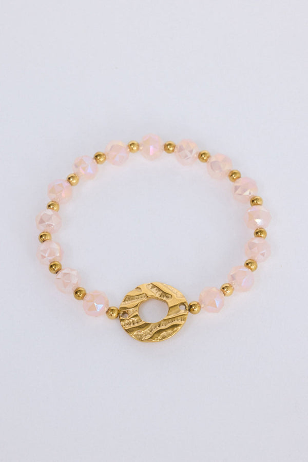 Clarke Bracelet in pink with statement gold charm detail, front view.