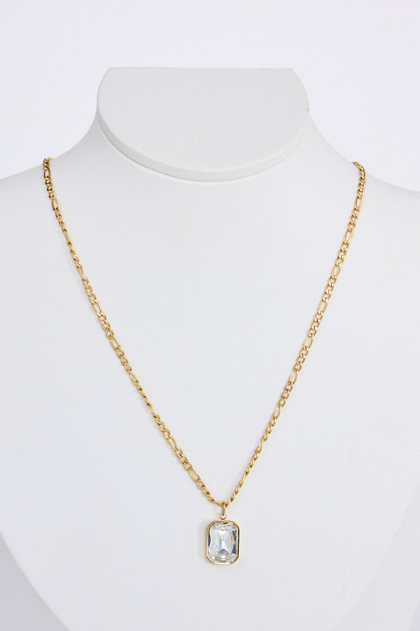Bovina Necklace in clear with a faceted rectangular pendant, front view.