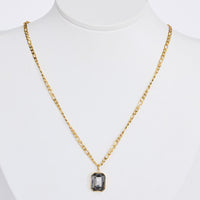Bovina Necklace in smoke with a faceted rectangular pendant, front view.