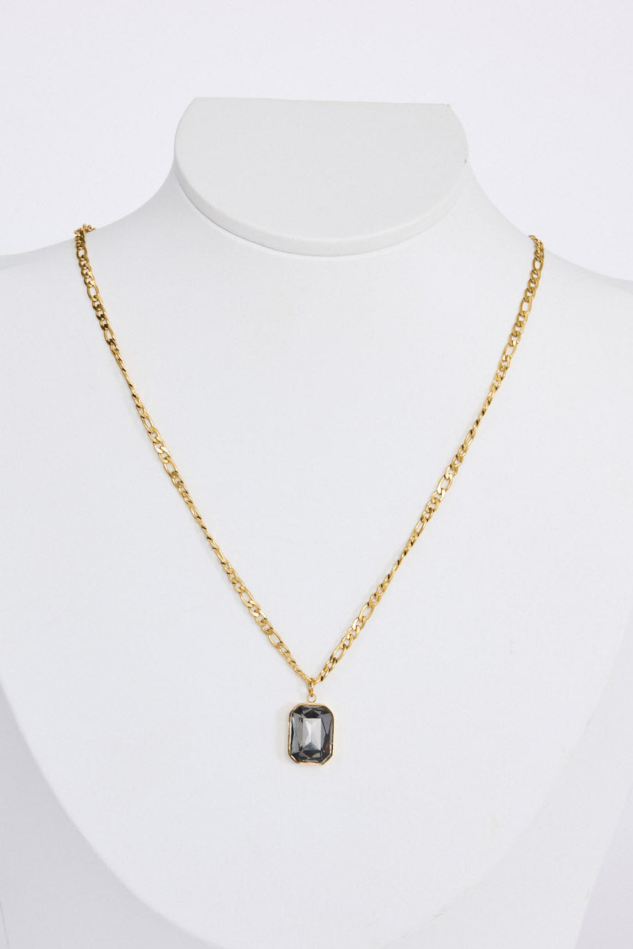 Bovina Necklace in smoke with a faceted rectangular pendant, front view.