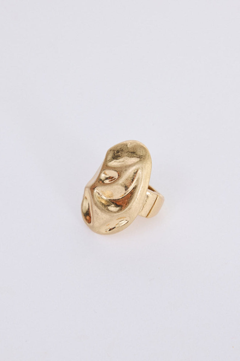 Jasmina Ring in gold with a sculptural finish, front view.
