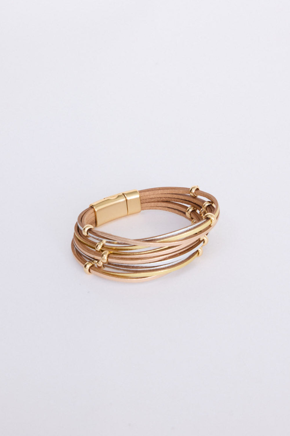 Ainsley Bracelet in metallic with fine metallic cords, angled view.