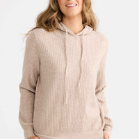 Model wearing Hush Knit Hoodie in caramel.