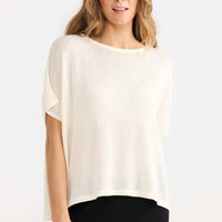 Model wearing Ruthie Knit Top in cream.