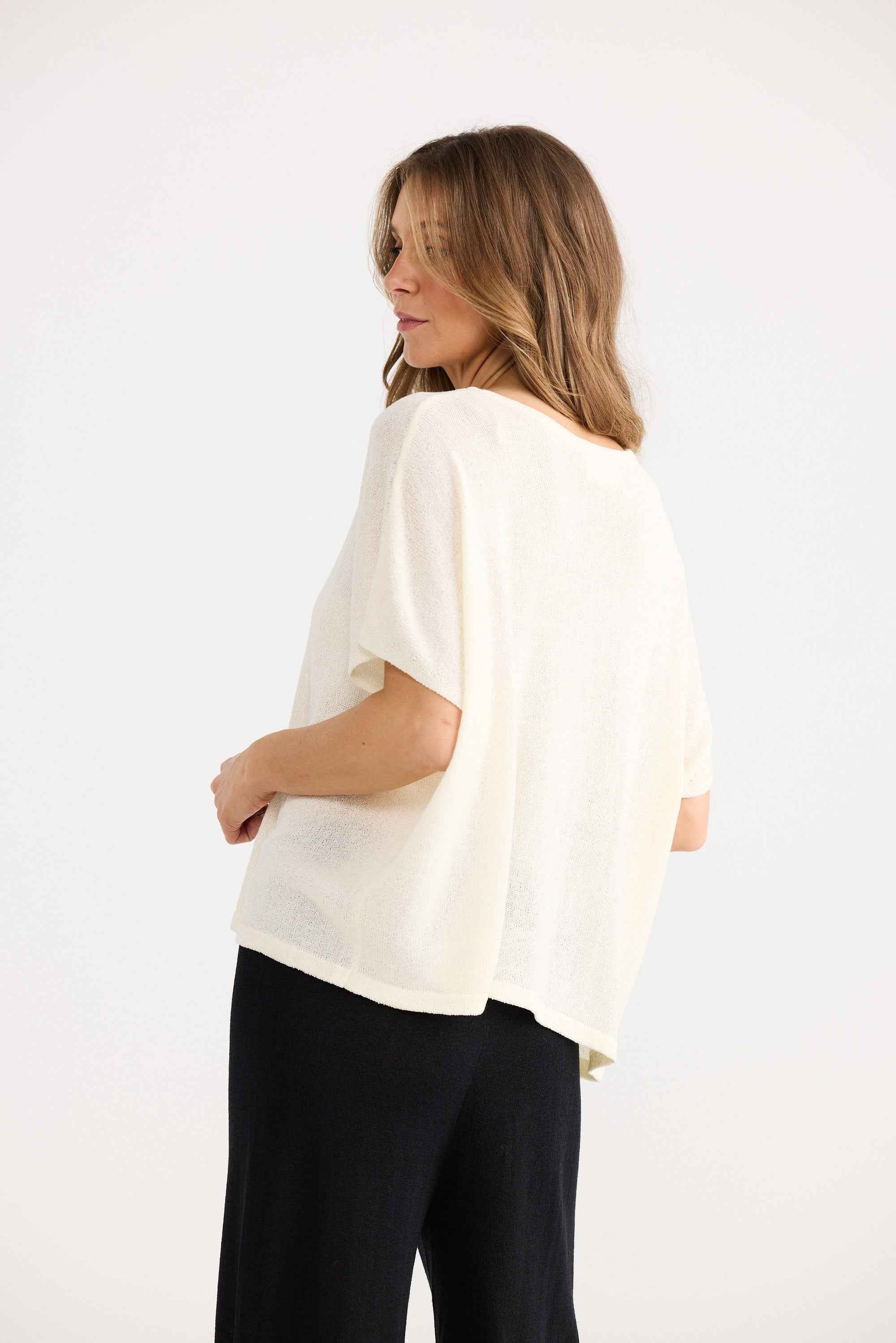 Ruthie Knit Top in cream, showing boat neckline.