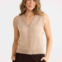 Model wearing Etta Knit Vest in caramel.