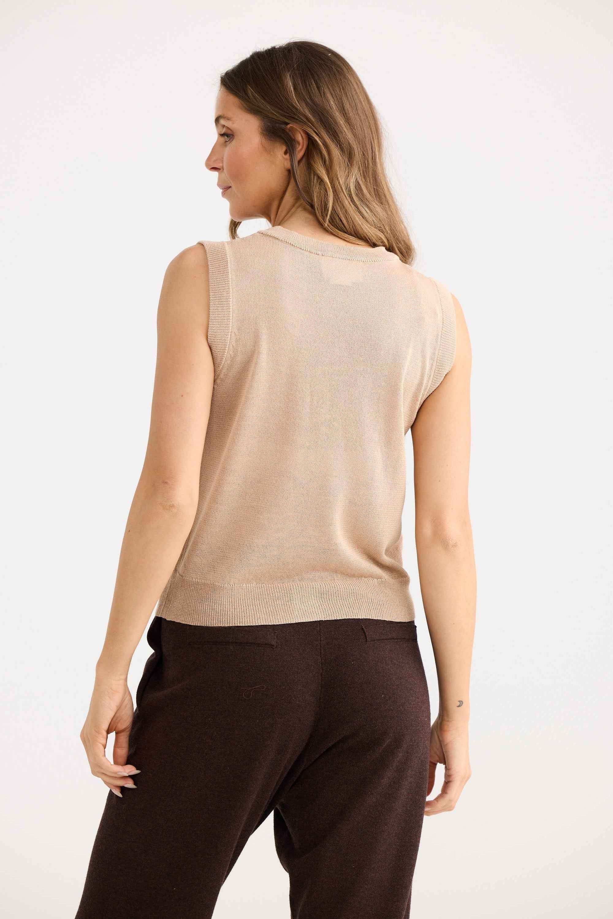 Etta Knit Vest in caramel, showing v neckline and ribbed trim.