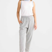 Model wearing Woodside Pant in grey.