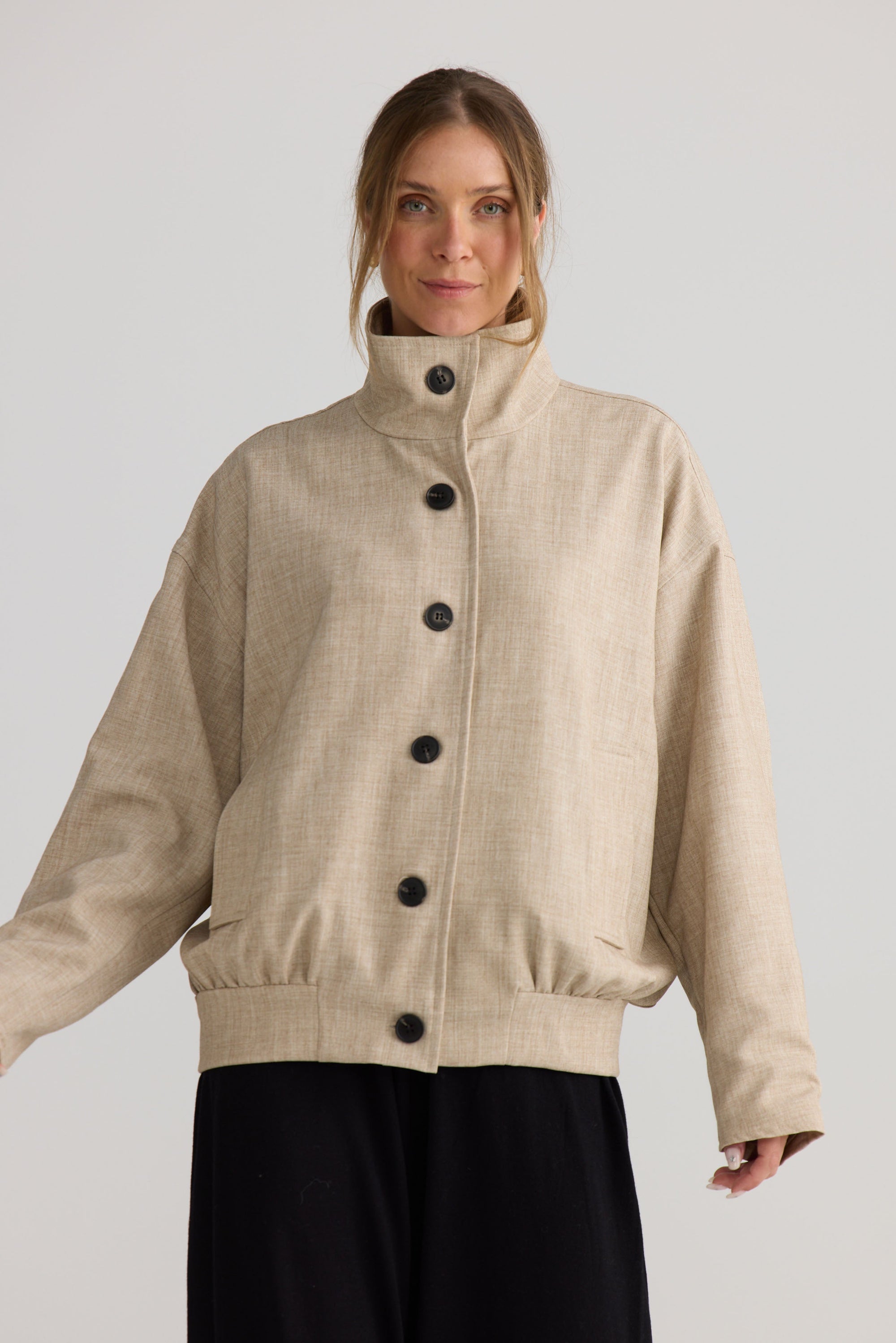 Edie Jacket in stone, shown on model.