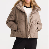 Model wearing Zella Puffer in bark.