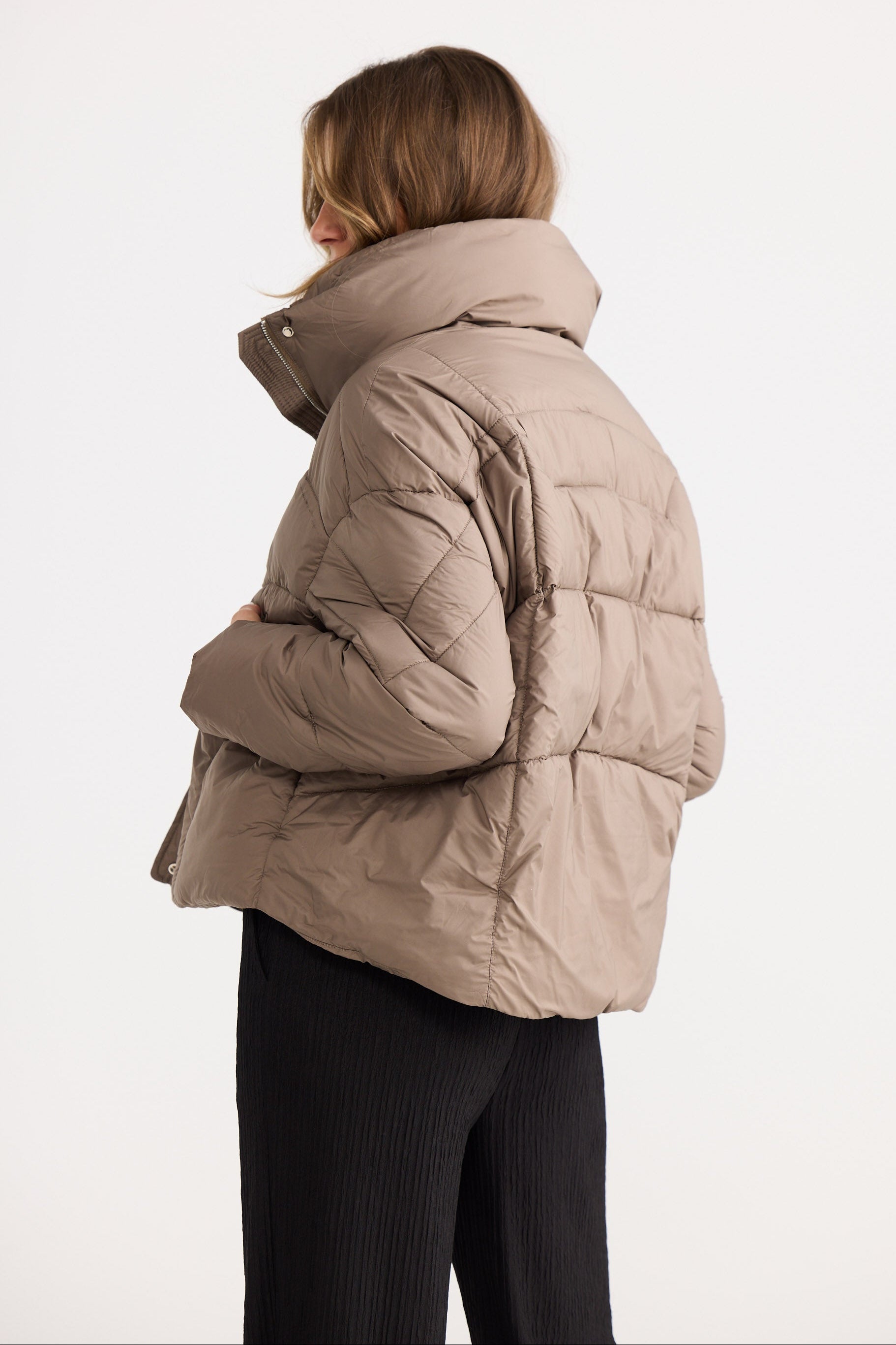 Zella Puffer in bark, showing open collared neckline.