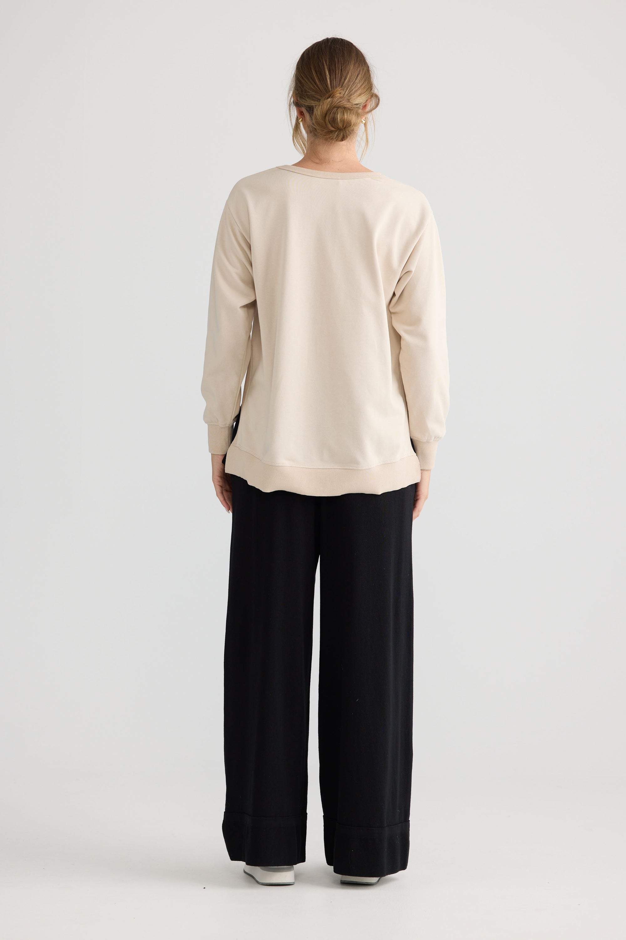 Faye Lounge Jumper in oat, shown on model.