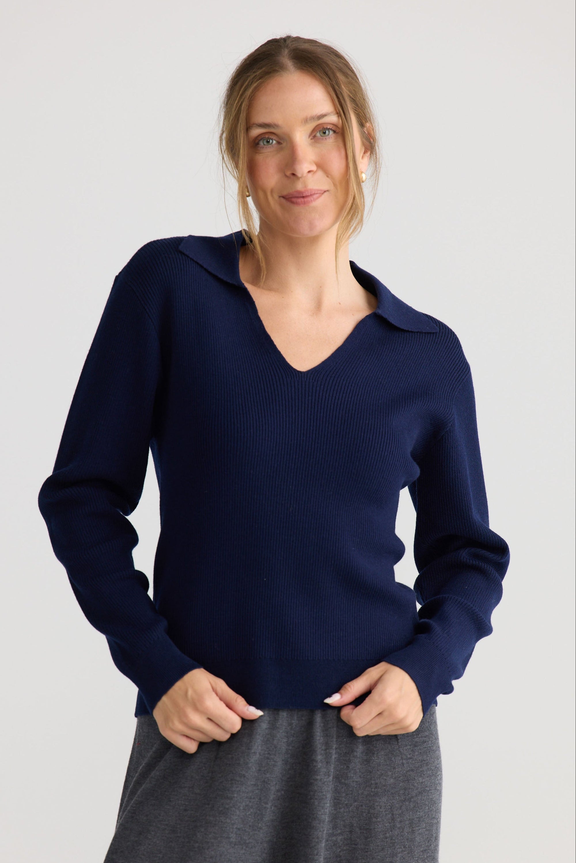 Model wearing Tilda Top in navy, showing relaxed top shape.