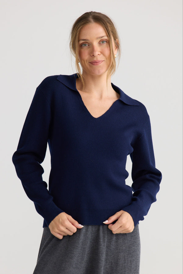 Model wearing Tilda Top in navy, showing relaxed top shape.