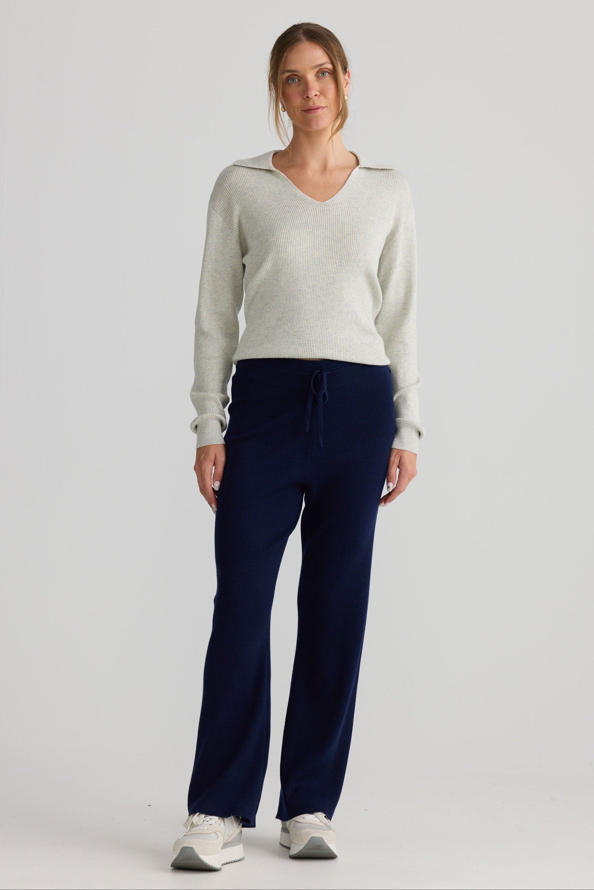 Model wearing Tilda Pant in navy.