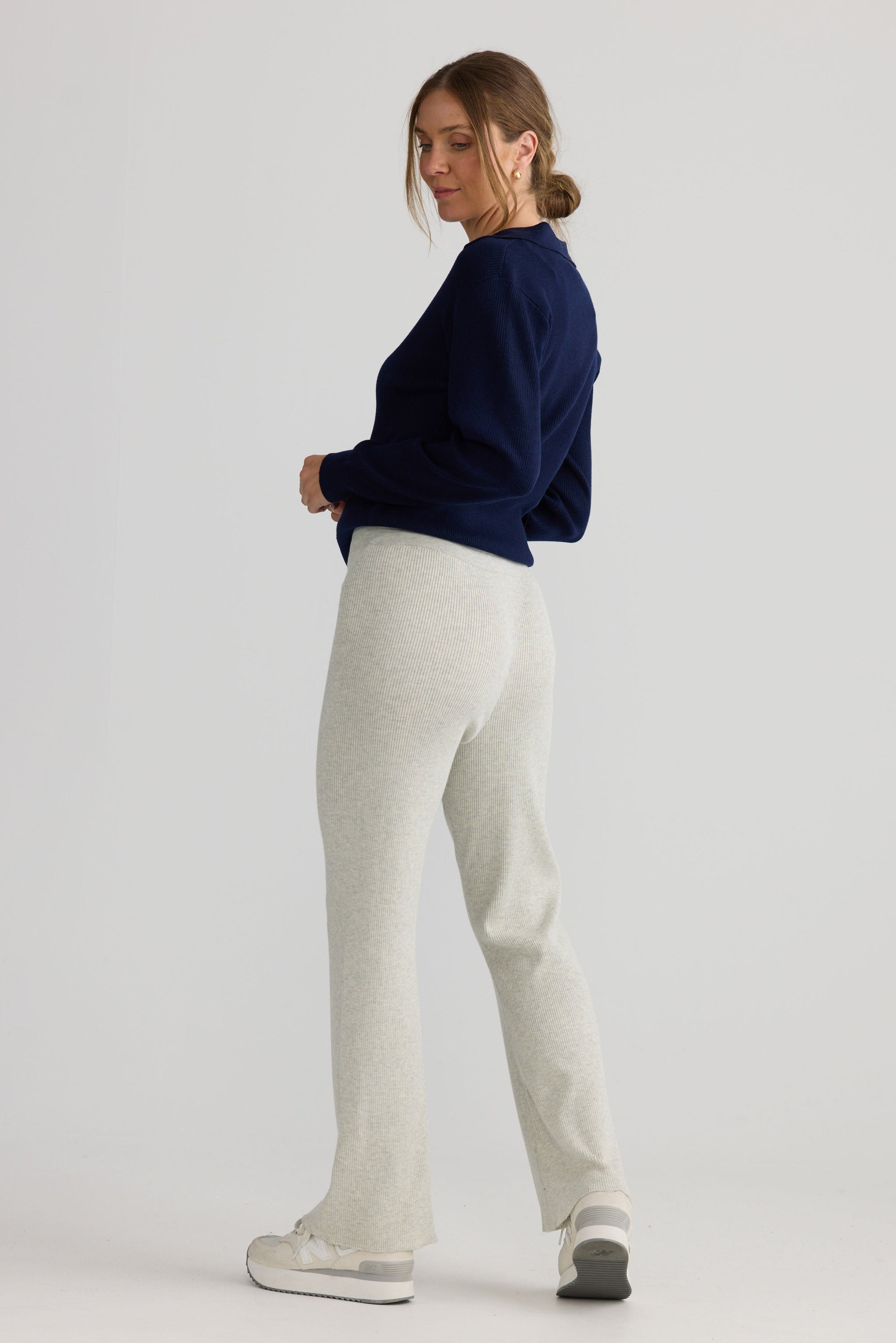 Model wearing Tilda Pant in oat, styled for everyday wear.