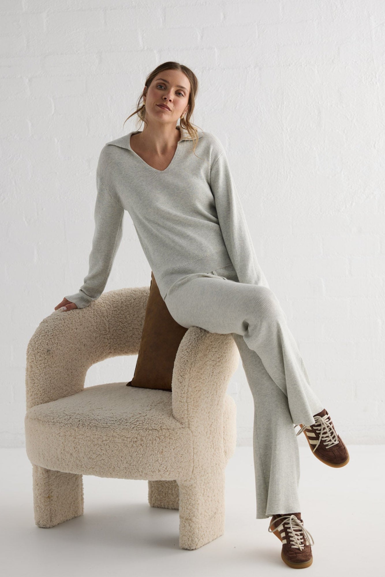 Campaign image of model wearing Tilda Pant in oat.