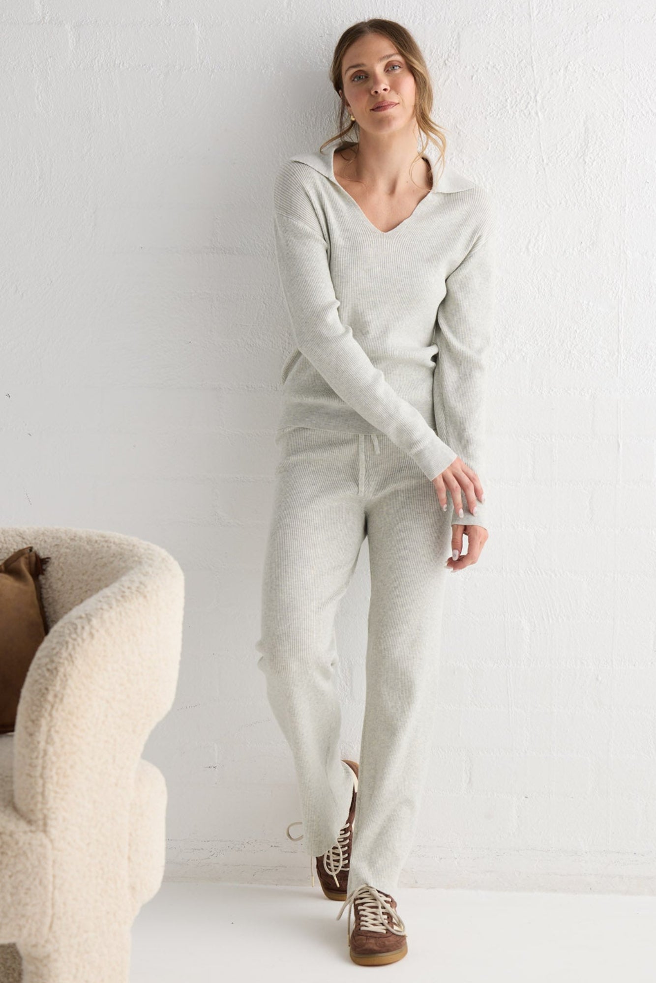 Campaign image of model wearing Tilda Pant in oat.