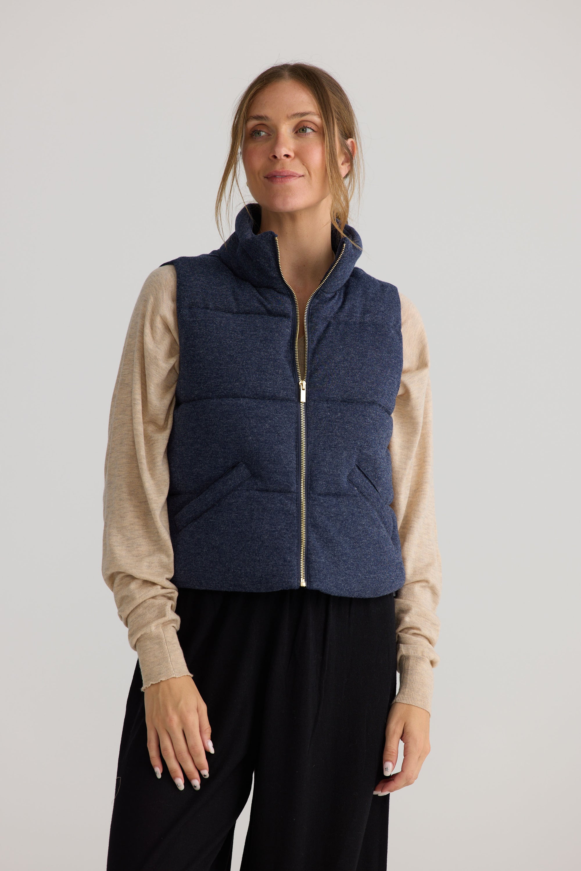 Tate Puffer Vest in navy, shown on model.