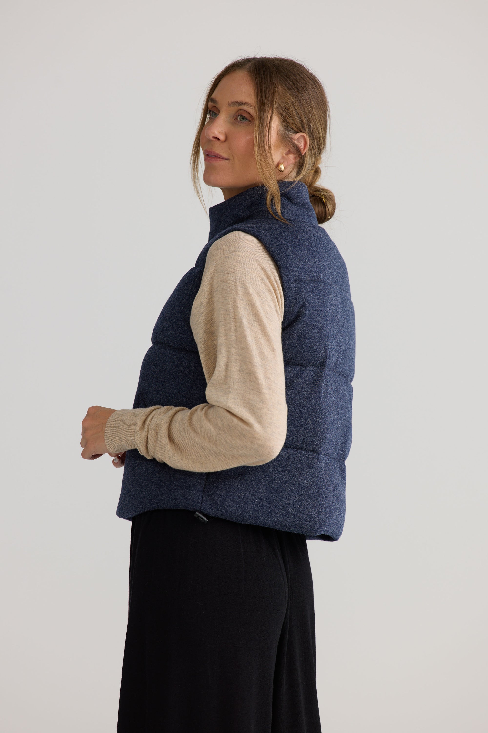 Tate Puffer Vest in navy, showing puffer quilting.