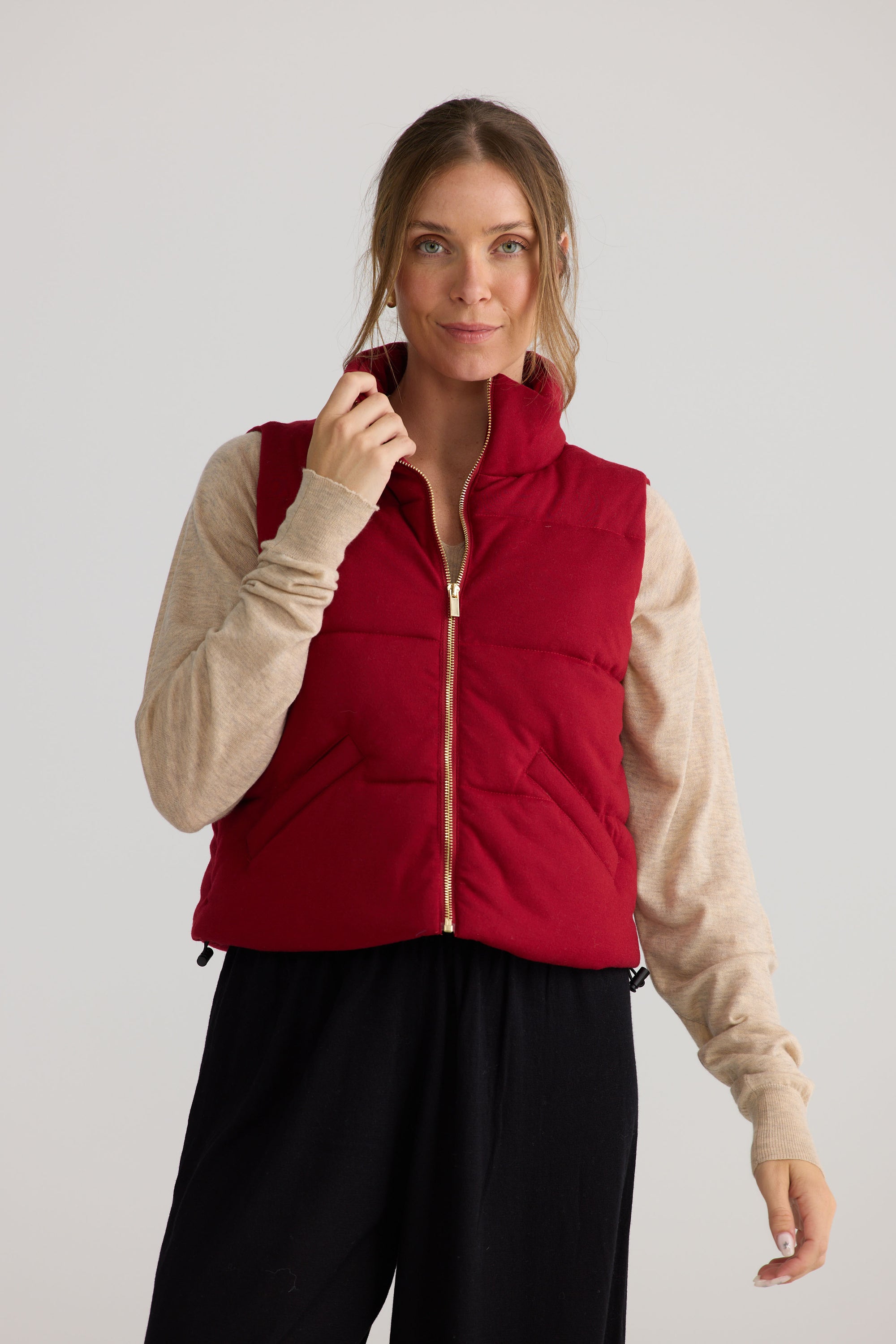Tate Puffer Vest in red, showing puffer quilting.