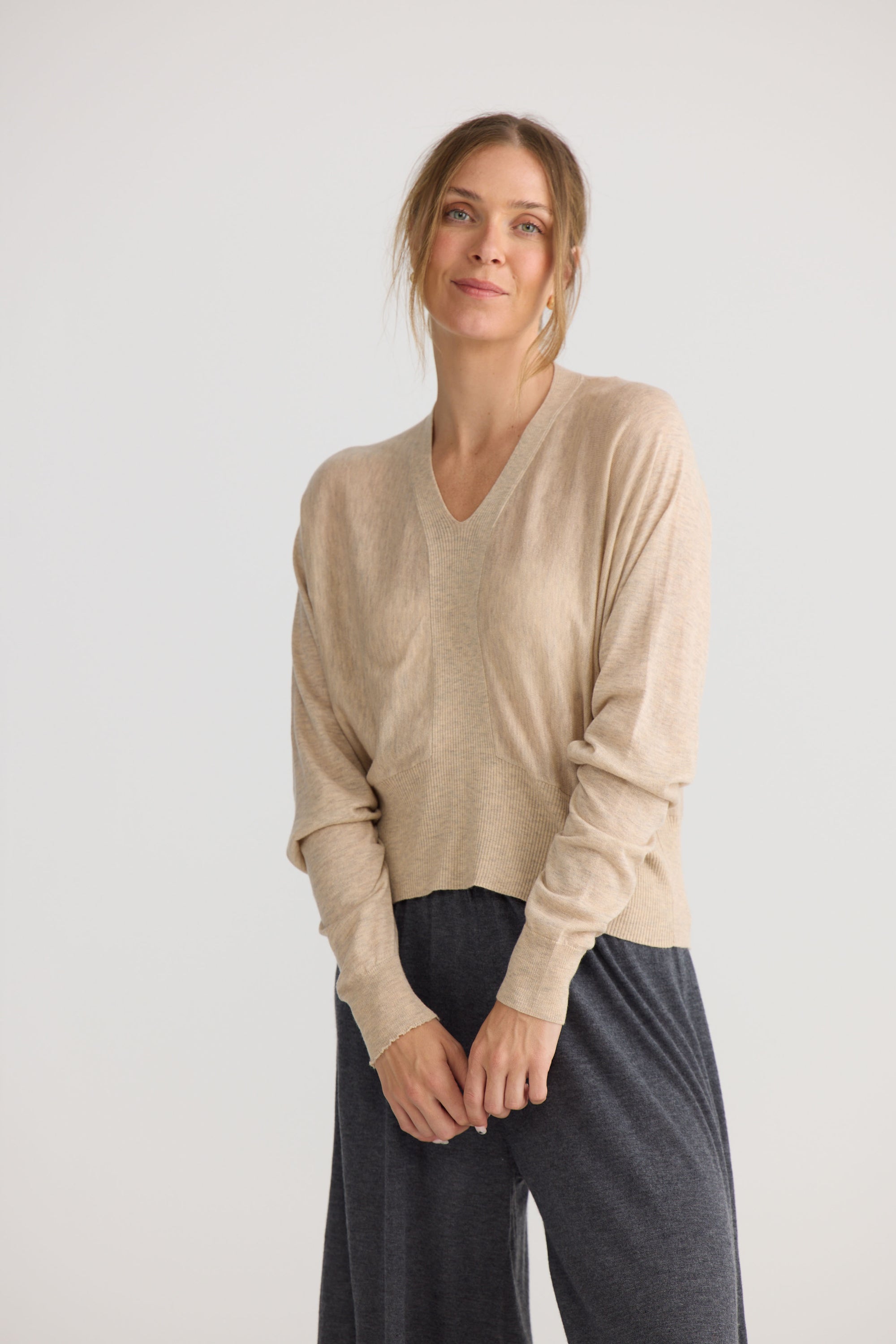 Stillness Knit in oat, shown on model.