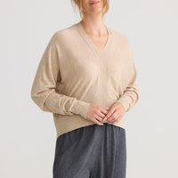 Model wearing Stillness Knit in oat.