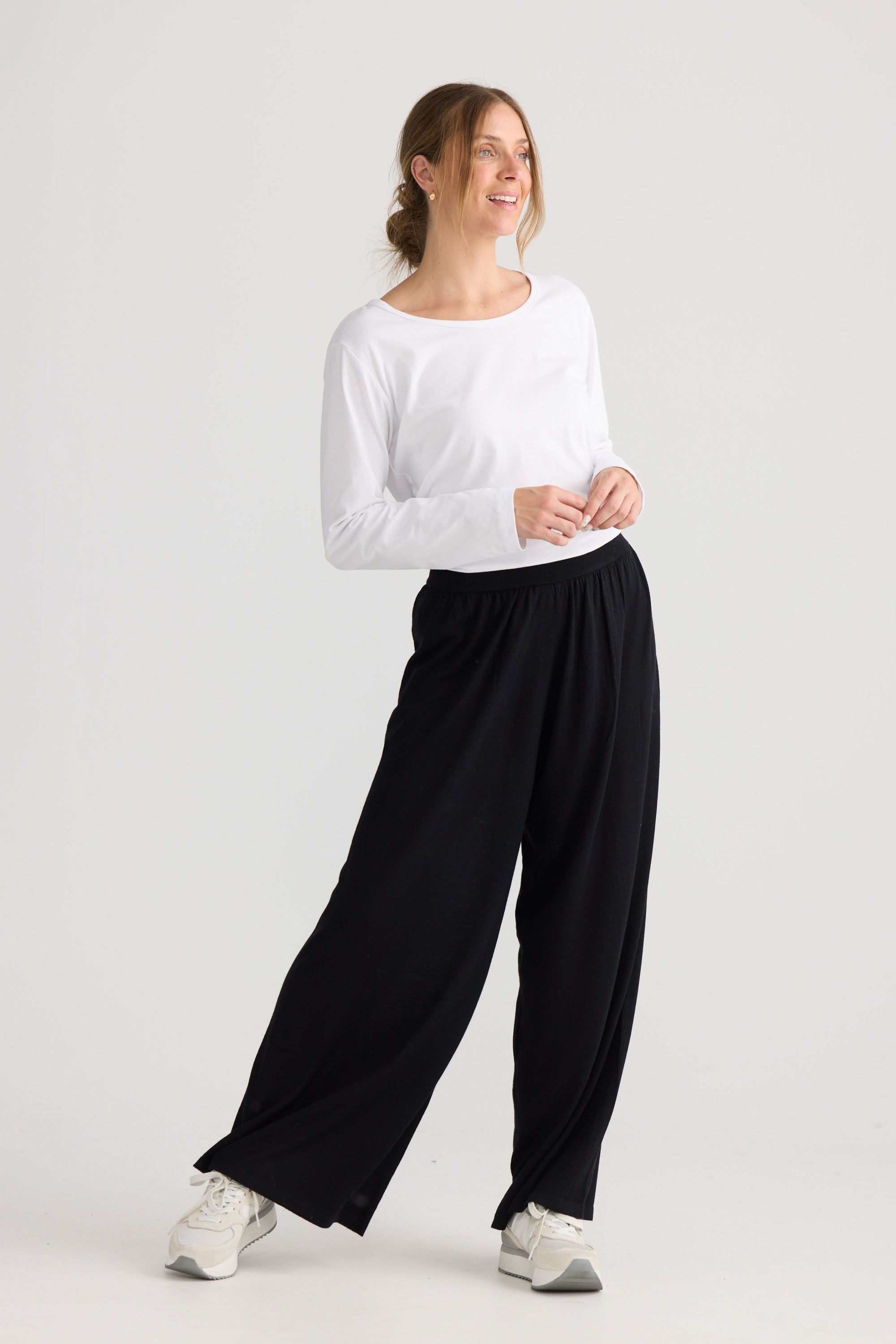Stillness Knit Pant in black, shown on model.