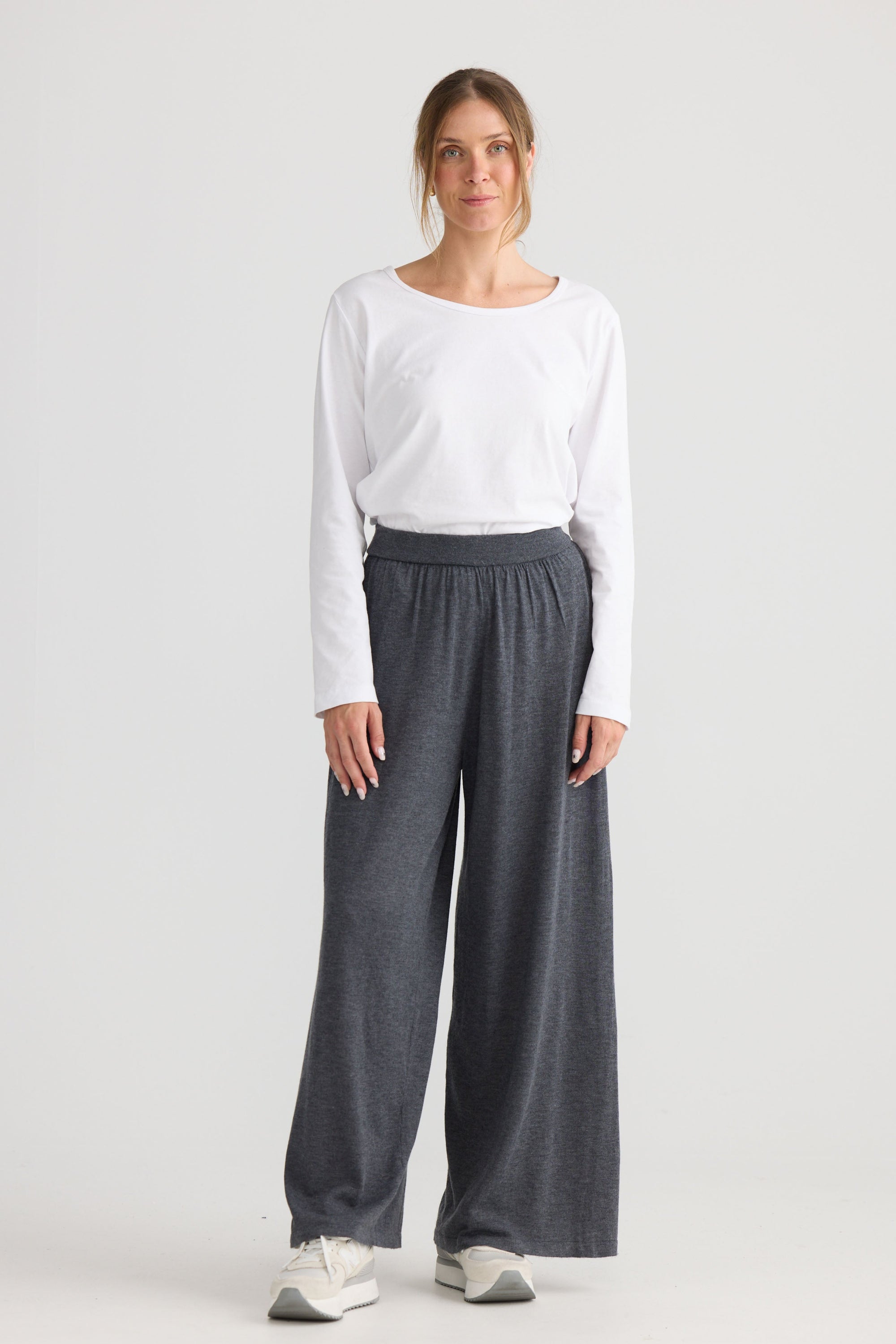 Stillness Knit Pant in charcoal, showing relaxed leg shape.