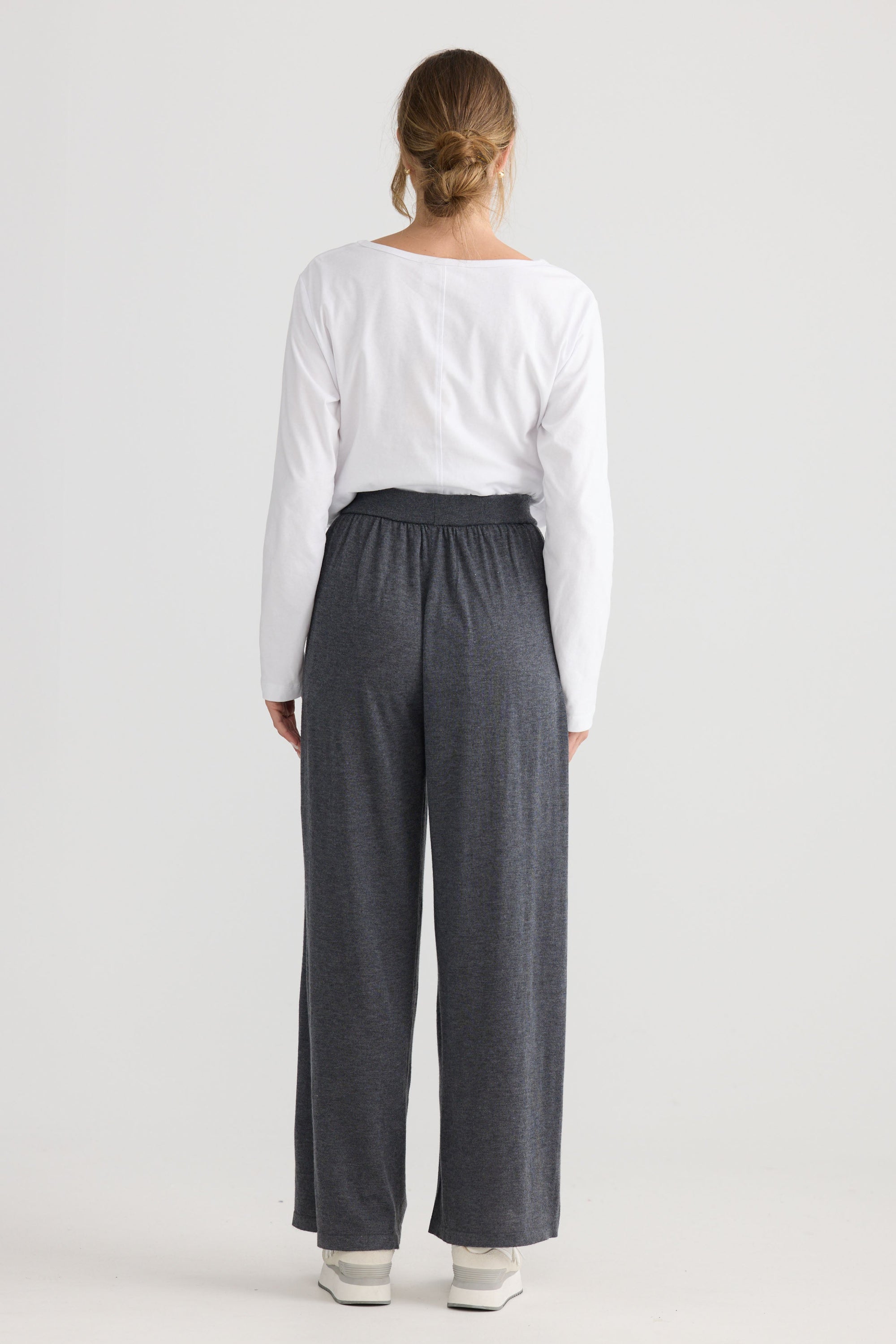 Stillness Knit Pant in charcoal, shown on model.