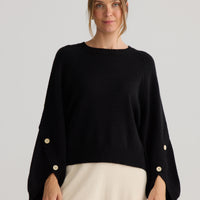 Model wearing Horizon Knit in black.