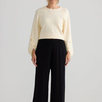 Awaken Knit Pant in black, shown on model.