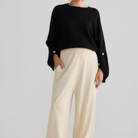 Awaken Knit Pant in dove, showing relaxed leg shape.